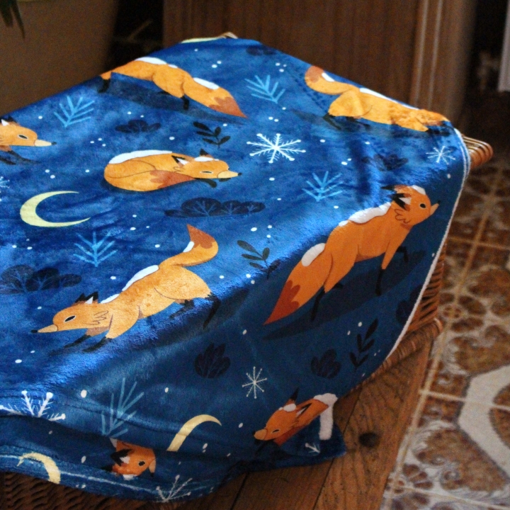 Plaid illustré renards sous la neige – Motif hivernal