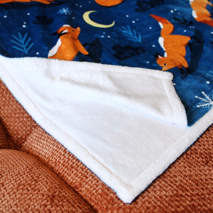 Plaid illustré renards sous la neige – Motif hivernal